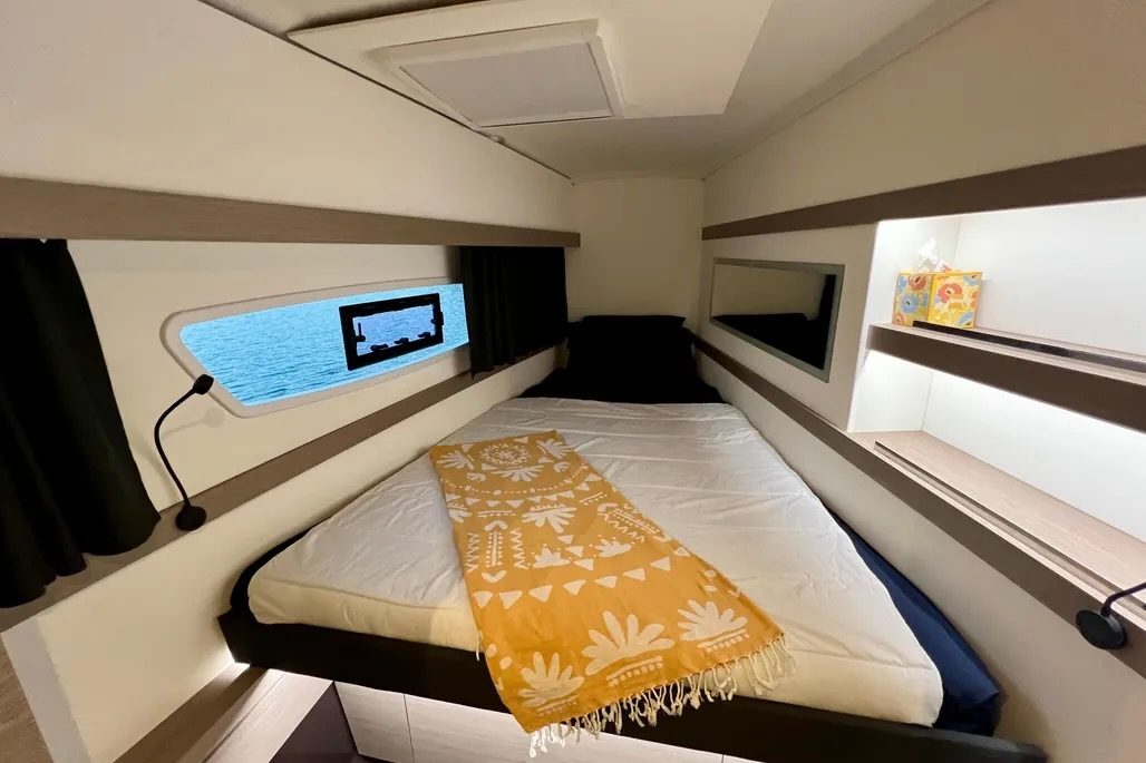 A made-up private cabin aboard the Fountaine Pajot Isla 40